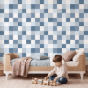 Ruitjesbehang in blauw voor de babykamer of kinderkamer