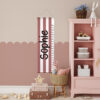 groeimeter met strepen in de kleur berry